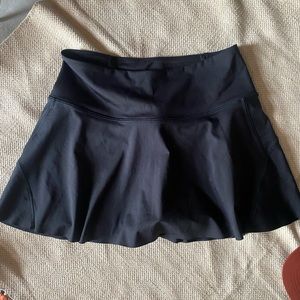 Brand new never worn Athleta skort. Size small.